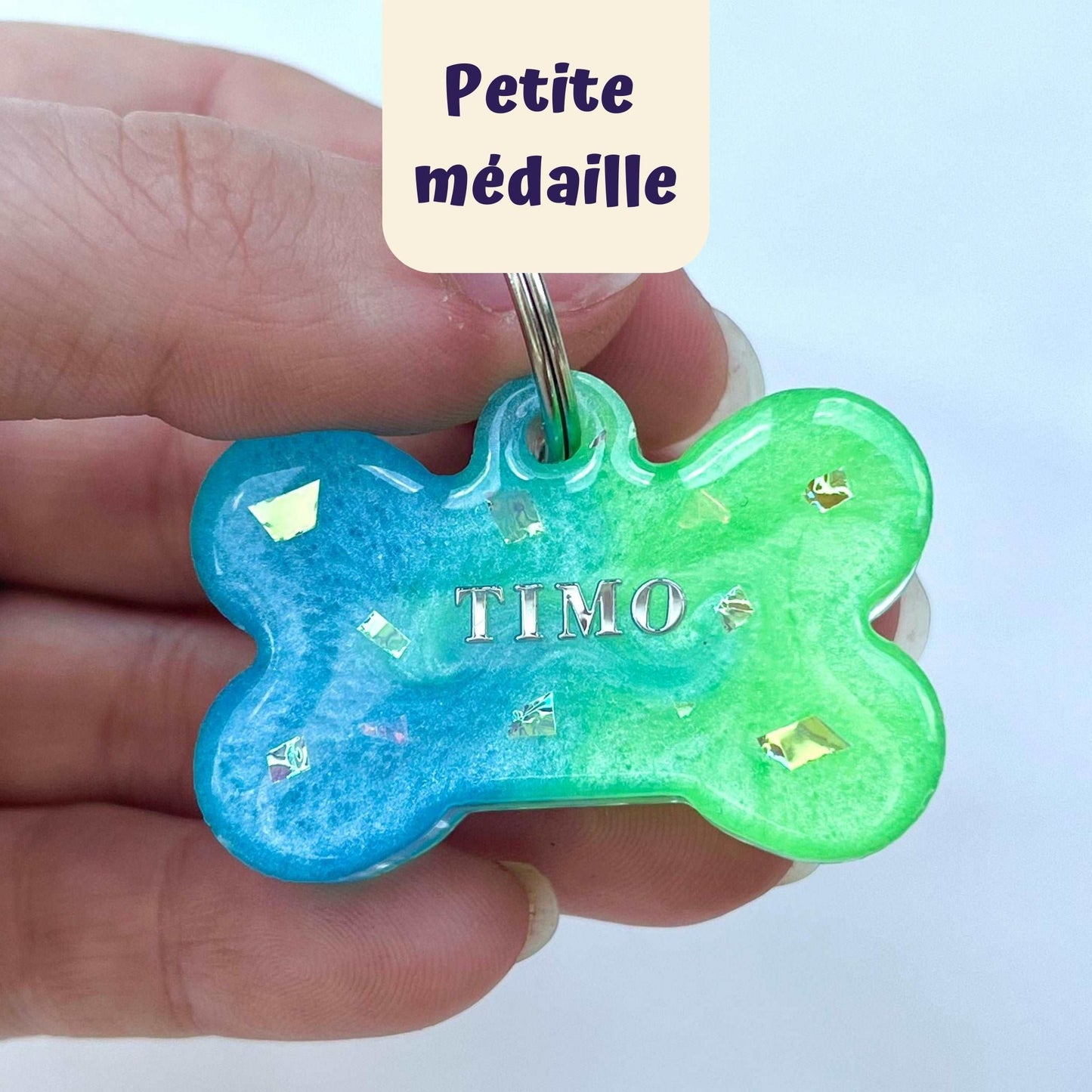 Beautiful cat tag, engraved with name and phone number. Color blue and green
